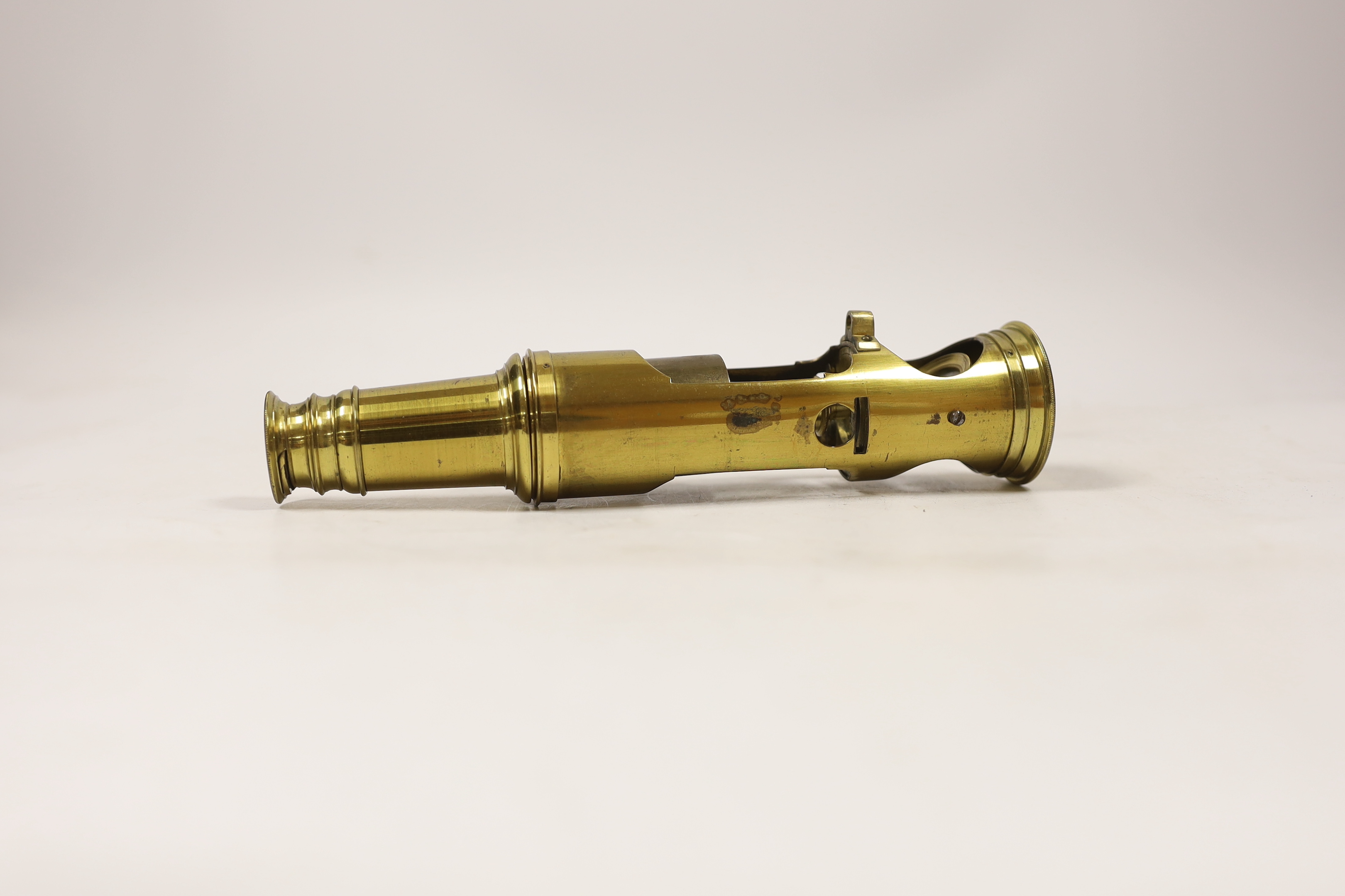 A boxed brass ‘drum’ style field microscope, in a fitted case, microscope 19cm high